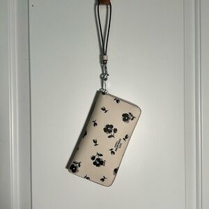 Coach wristlet wallet, cream floral print, slightly used, great condition